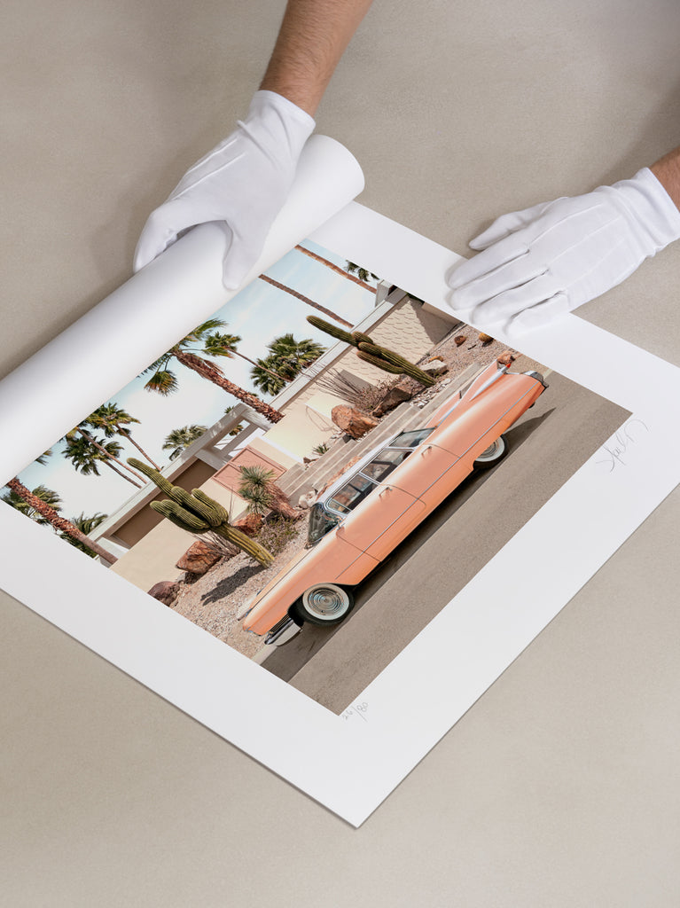 Paul Fuentes holding fine art print of California Dreaming, palm springs. musuem qualty, fine art paper