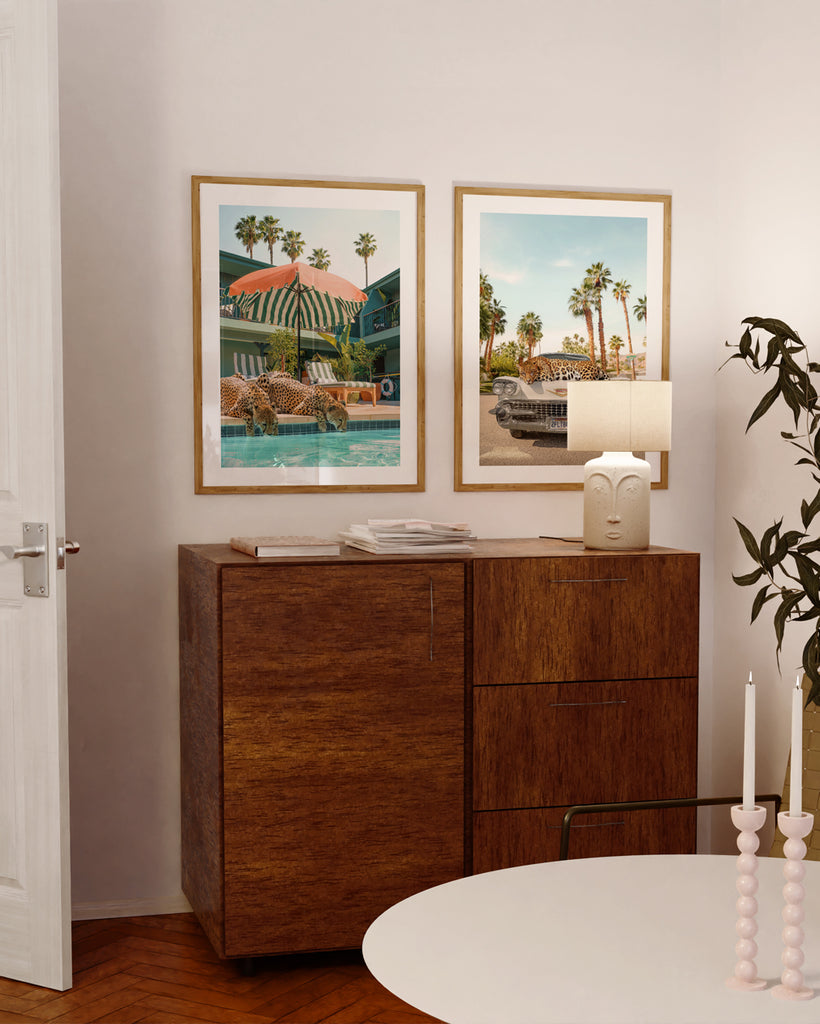 framed artworks featuring two cheetahs sipping from the pool at Palihotel Hollywood from Palisociety. fine art print by Paul Fuentes