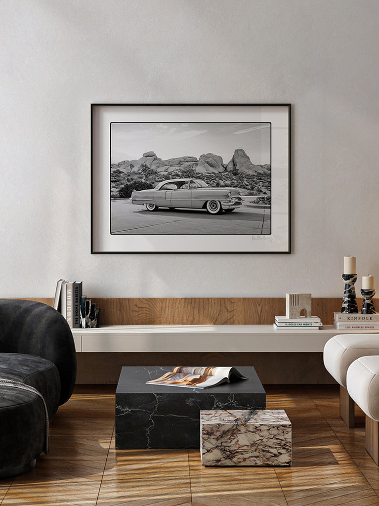 framed artwork. Black and white fine art photograph of a classic Cadillac in the Joshua Tree desert, part of Paul Fuentes’ minimal and elegant Black & White Collection.