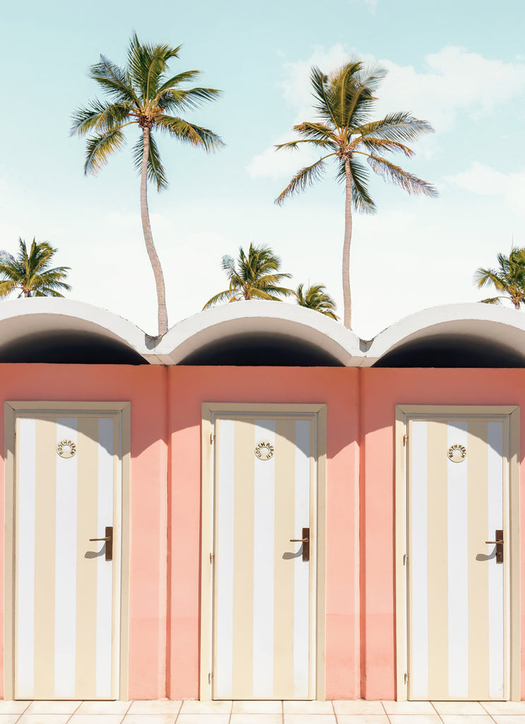 A print featuring a pair of pastel beach doors with a tropical background, including palm trees and a clear blue sky, fine art photograph by Paul Fuentes.
