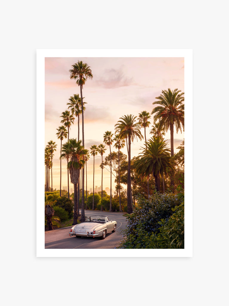 Vintage car cruising through Los Angeles at golden hour, fine art photography by Paul Fuentes.