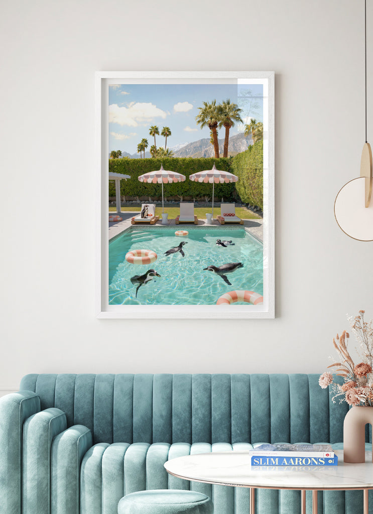 framed artwork of Penguins lounging  and swimming at the coco cabana in Palm Springs a fine art photograph by Paul Fuentes.