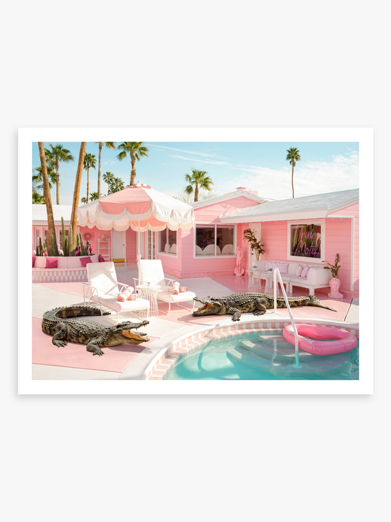 art print of two Crocodiles by the pool at the pink Trixie Motel in palm springs, fine art photography by Paul Fuentes.