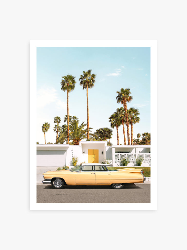 artwork of yellow vintage car parked outside a Palm Springs mid-century house, fine art photography by Paul Fuentes.