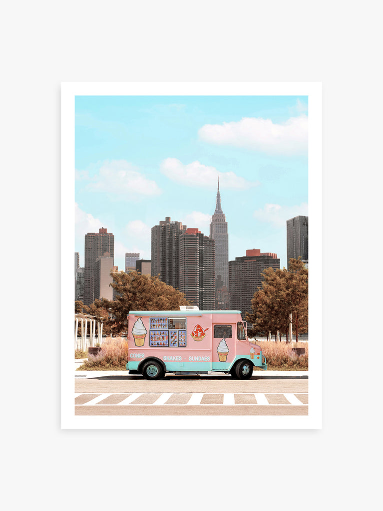 art print of pink ice cream truck on a new york city street with a skyline and empire state buidling in the background, fine art photography by paul fuentes