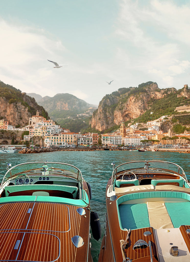 Amalfi Coast art print by Paul Fuentes featuring two wooden retro italian speed boats and amalfi coastal scenery.
