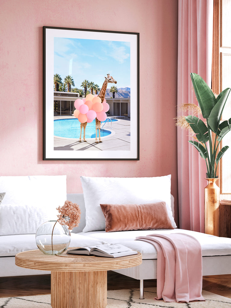 framed artwork of a Giraffe dressed in balloons standing beside a Palm Springs home, fine art photograph by Paul Fuentes.