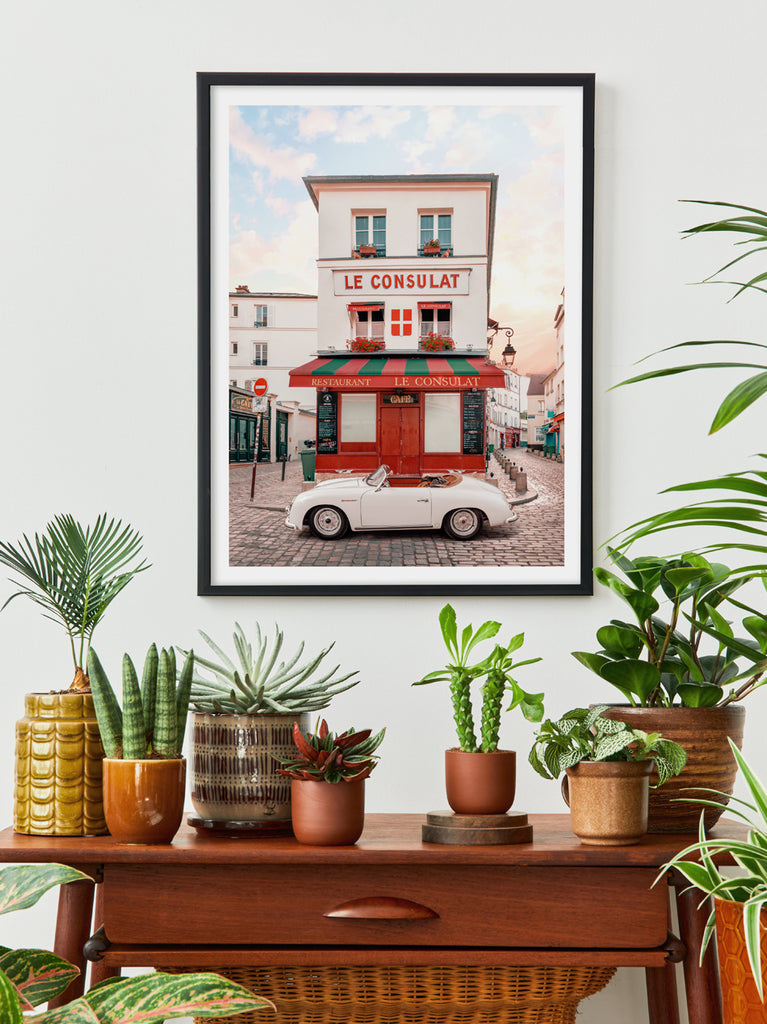 Framed wall at of Le Consulat print by Paul Fuentes showing a Porsche Speedster parked in front of the iconic Paris Montmartre restaurant.