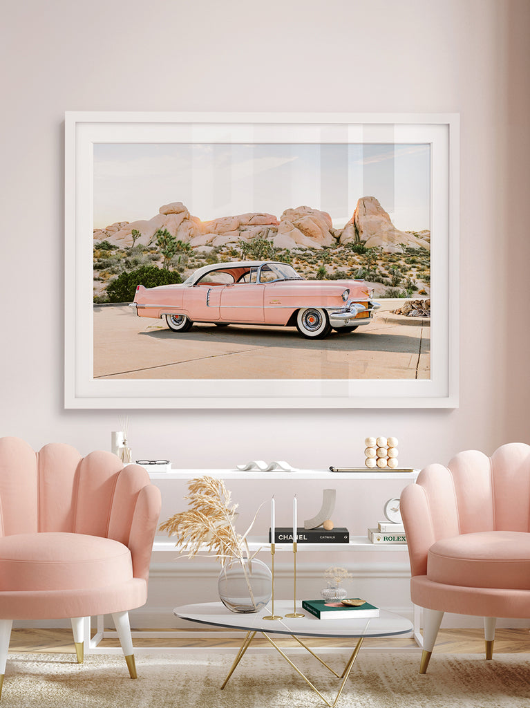 Framed Artwork of a Pink Cadillac parked in pastel desert landscape in joshua tree, fine art photography by Paul Fuentes.