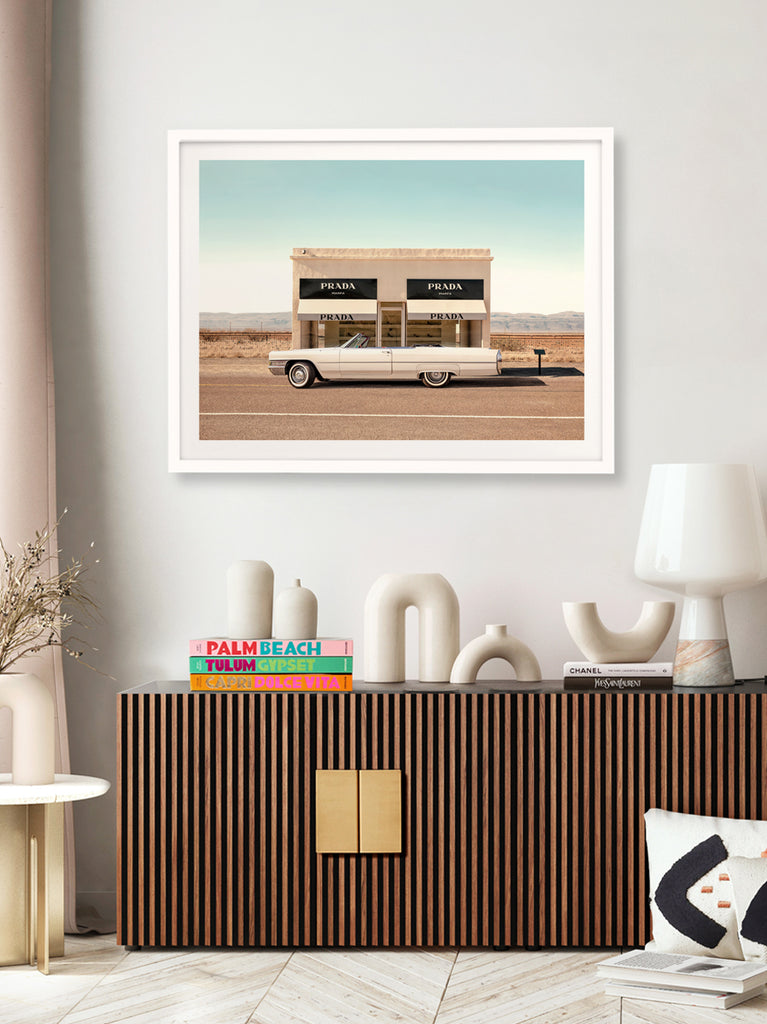 framed artwork of a Classic car parked near Prada Marfa sculpture in Texas desert, fine art photography by Paul Fuentes.